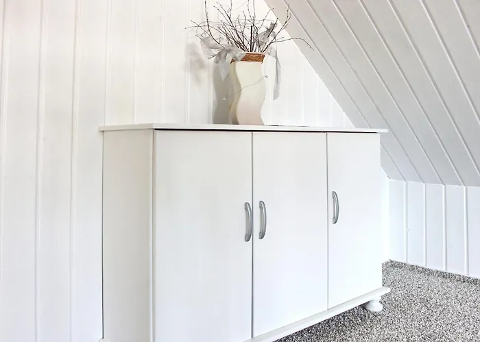 Nyaraló Windspiel Kleeden